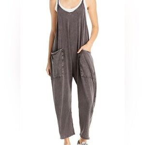 Free people movement jumpsuit. Never worn. Size XS
